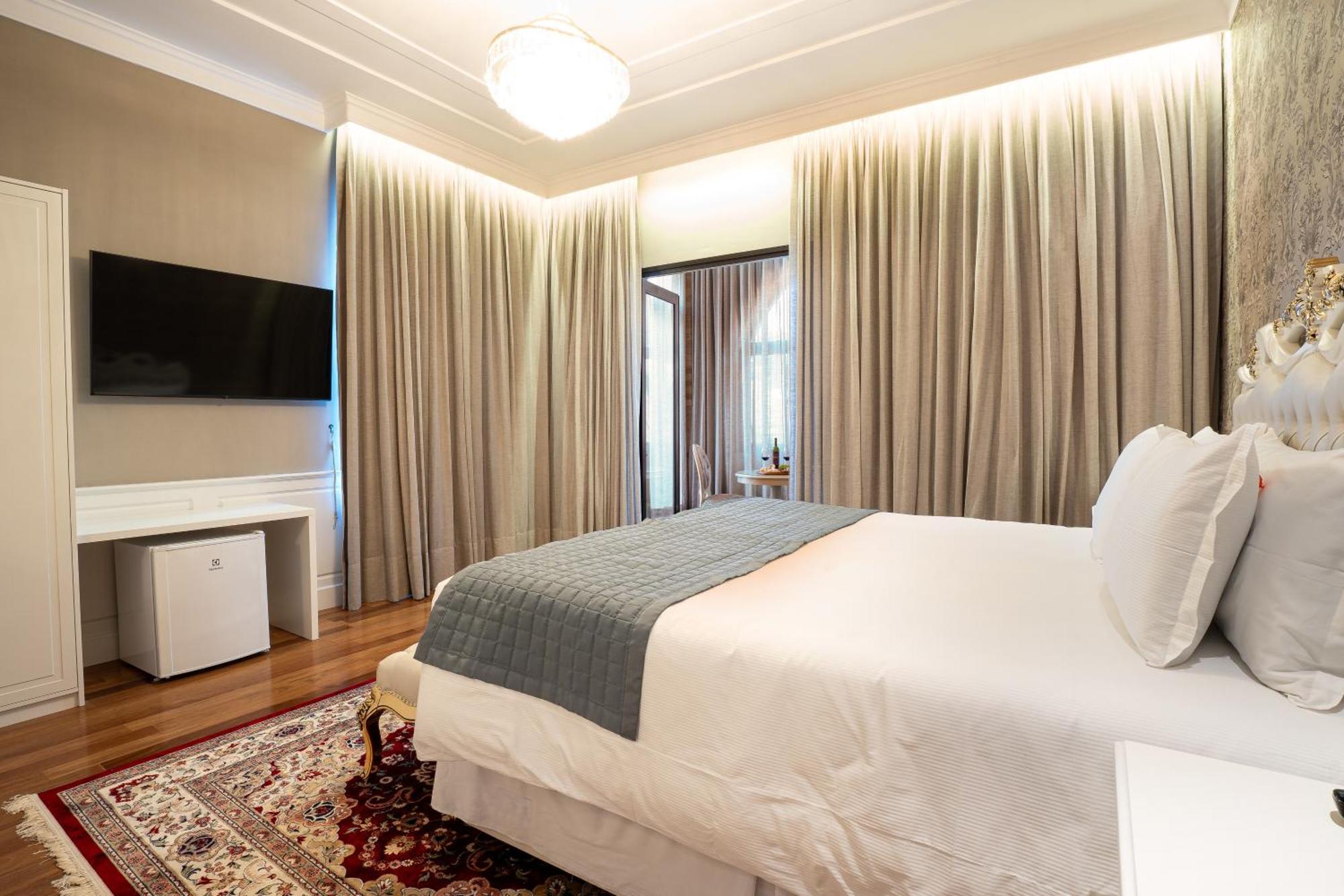 포우사다 루이스 XV 호텔 Campos do Jordão 외부 사진 A bedroom at the hotel