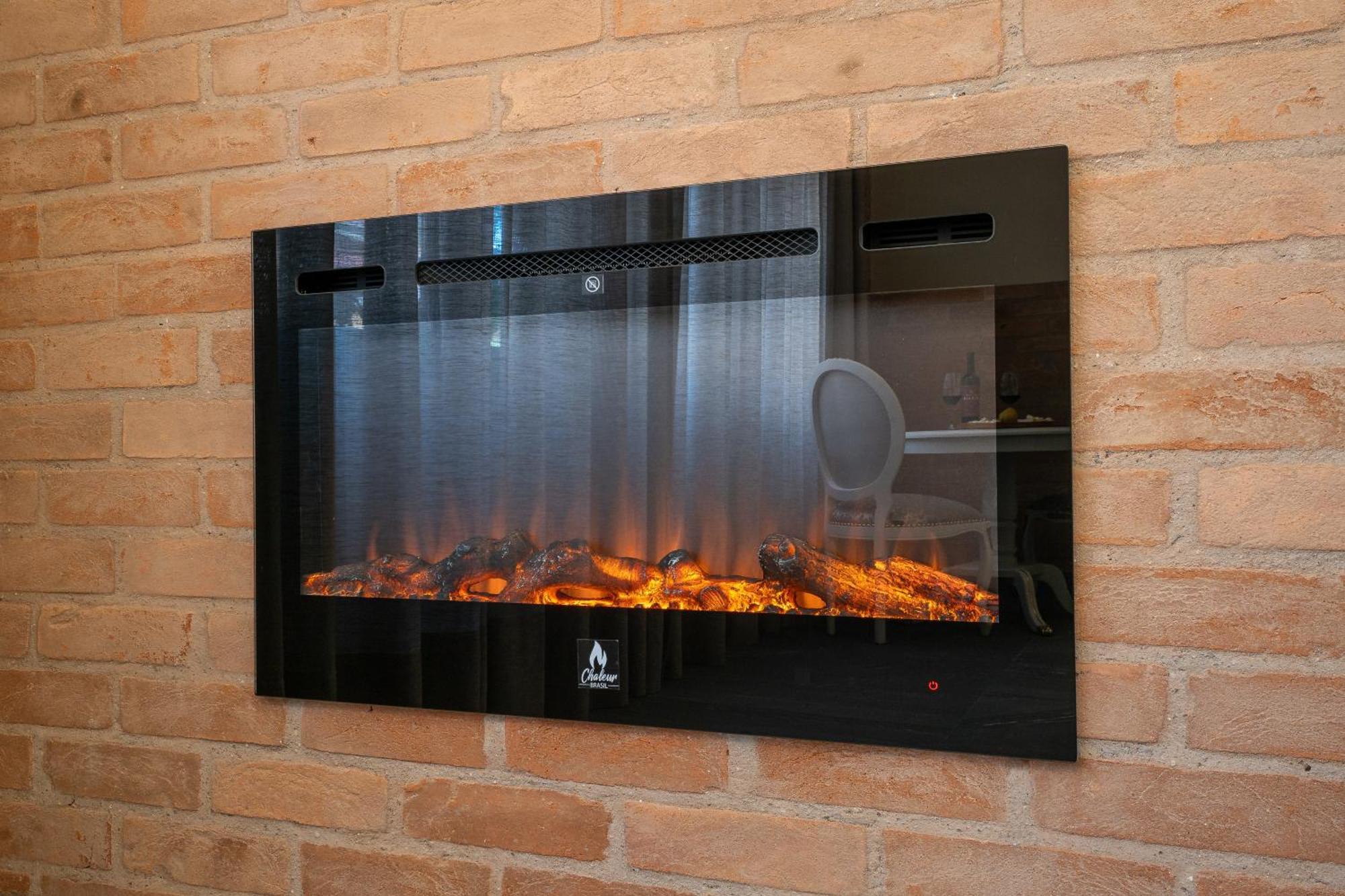 포우사다 루이스 XV 호텔 Campos do Jordão 외부 사진 A wall mounted electric fireplace