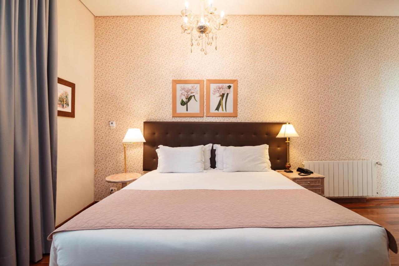 포우사다 루이스 XV 호텔 Campos do Jordão 외부 사진 A bedroom at the hotel